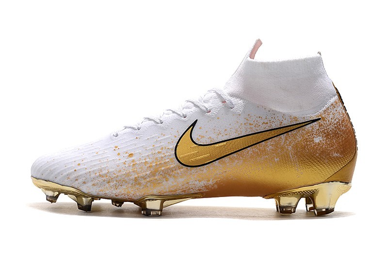 nike football boots gold and black