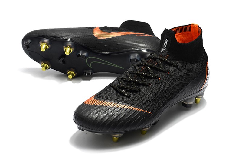 black and orange nike cleats