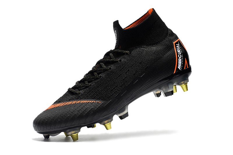 black and orange soccer cleats