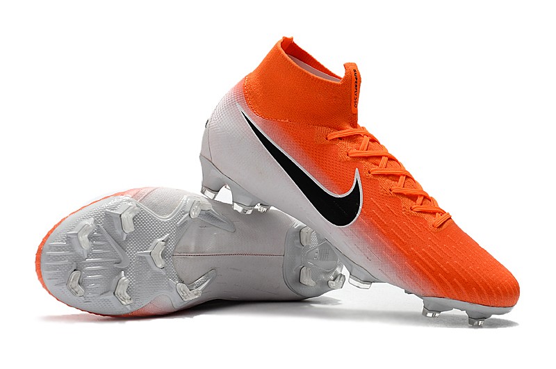 orange and white nike cleats