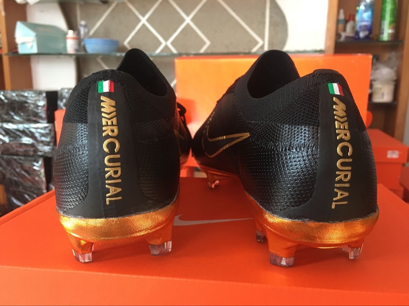 black and gold nike mercurial