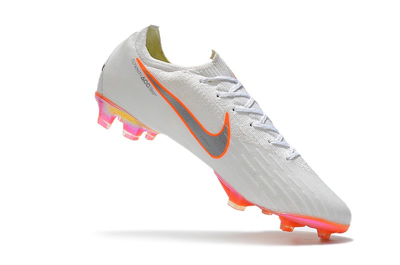 white and orange mercurial