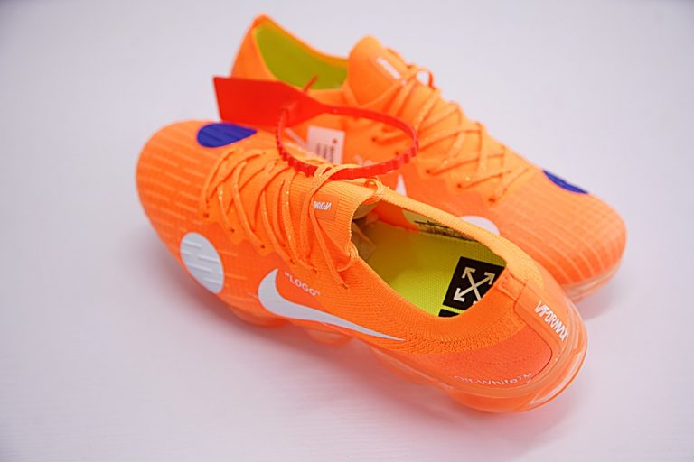 white and orange nike vapormax