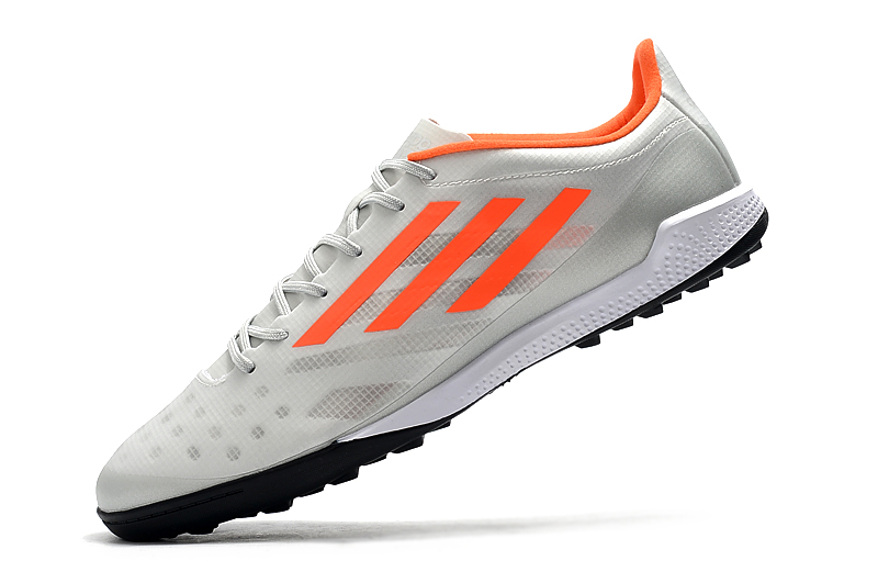 Adidas X99 19.1 TF white orange Left