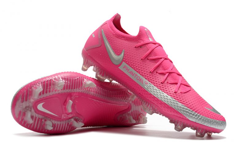 white and red nike football boots