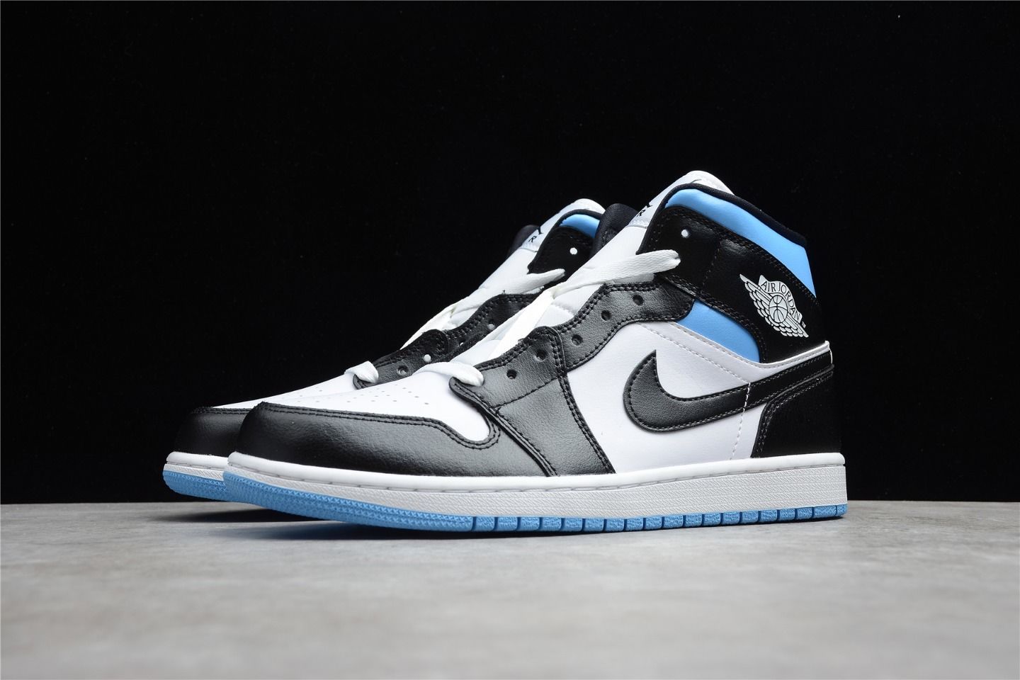 Nike Air Jordan 1 Mid - University Blue / Black / White – Kith Europe